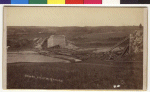 The force of the winds from the 1883 tornado blew the railroad bridge into the Zumbro River.