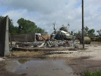 link to larger image of tornado damage