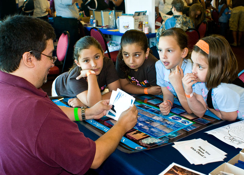 Mike Castillo describing clouds to attentive children at Storm Fury 2010