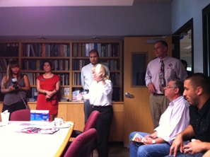 Angela Burton, President of the Brownsville Chamber of Commerce, presents door prize at the June 2013 coffee talk held at NWS Brownsville/RGV