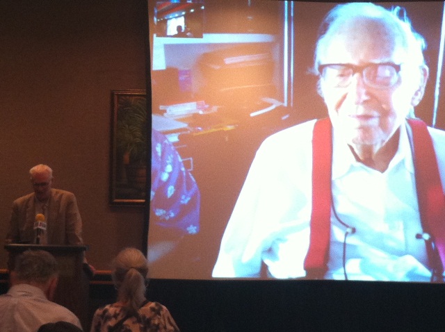 Dr. Robert Simpson, NHC Director from 1968 to 1973, is honored by Dr. William Gray of the Tropical Meteorology Product