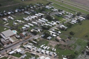 Residential flooding and roof damage from winds near Raymondville (click to enlarge)