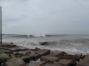 Estimated 12 foot wave or more entering jetty waters, Isla Blanca Park (click to enlarge)