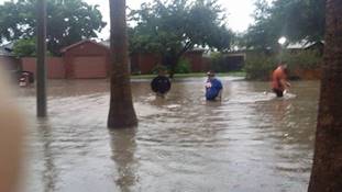 Heavy rainfall and poor drainage combine to produce up to 3 feet of standing water in San Juan, Texas, late afternoon of May 30, 2015