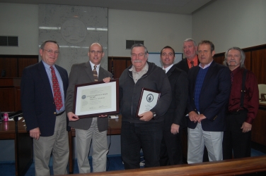 White County commissioners, from left, are Terry Goodger, Lans and Bill, Travis Turner, Edwin Nix, Lyn Holcomb and Craig Bryant.