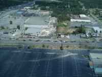 [ Aerial photo of damage along Pio Nono Avenue. ]