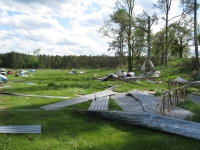 [ Damage and debris at airstrip. ]