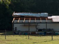 [ barn roof peeled back ]