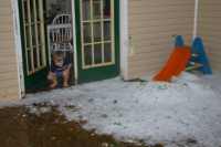 [ Accumulation of hail on the porch. ]