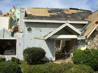 [ severely damaged house ]