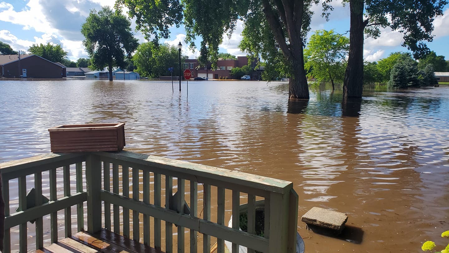 Photo of flood waters up to photographer's deck in Hawarden Iowa