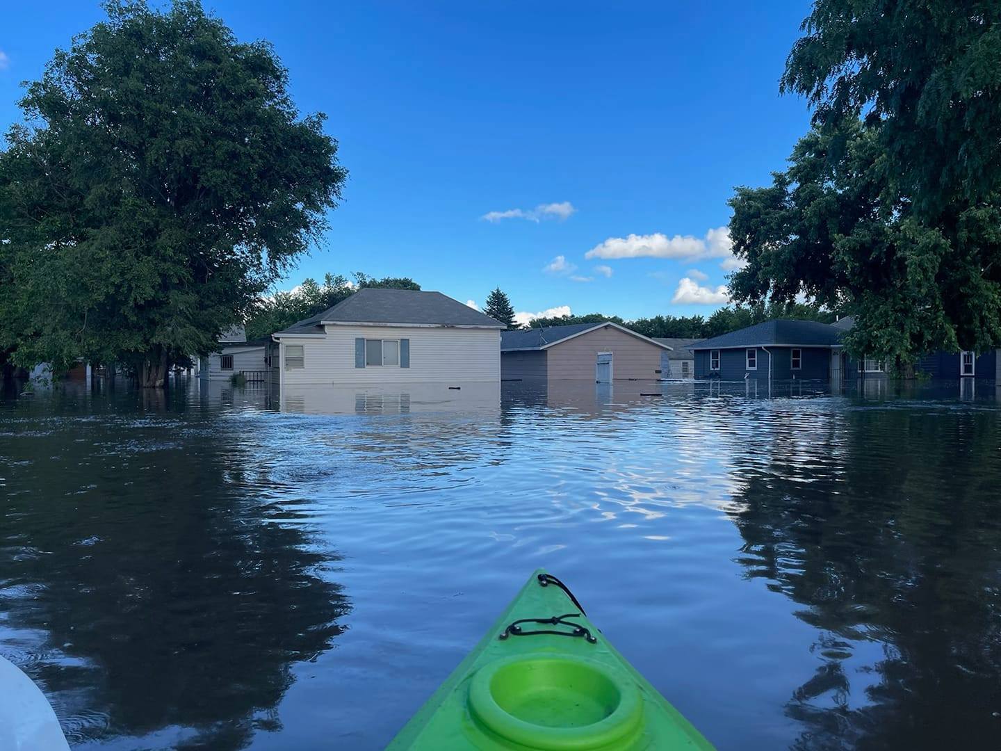 Photo of flooded homes in Hawarden Iowa taken from a kayak