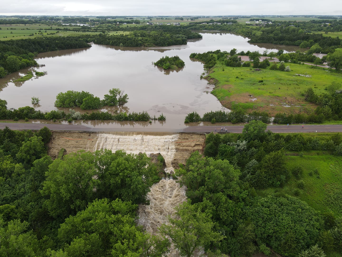 Aerial Photo of a flooded Lake Alvin near Sioux Falls spilling over a nearby road