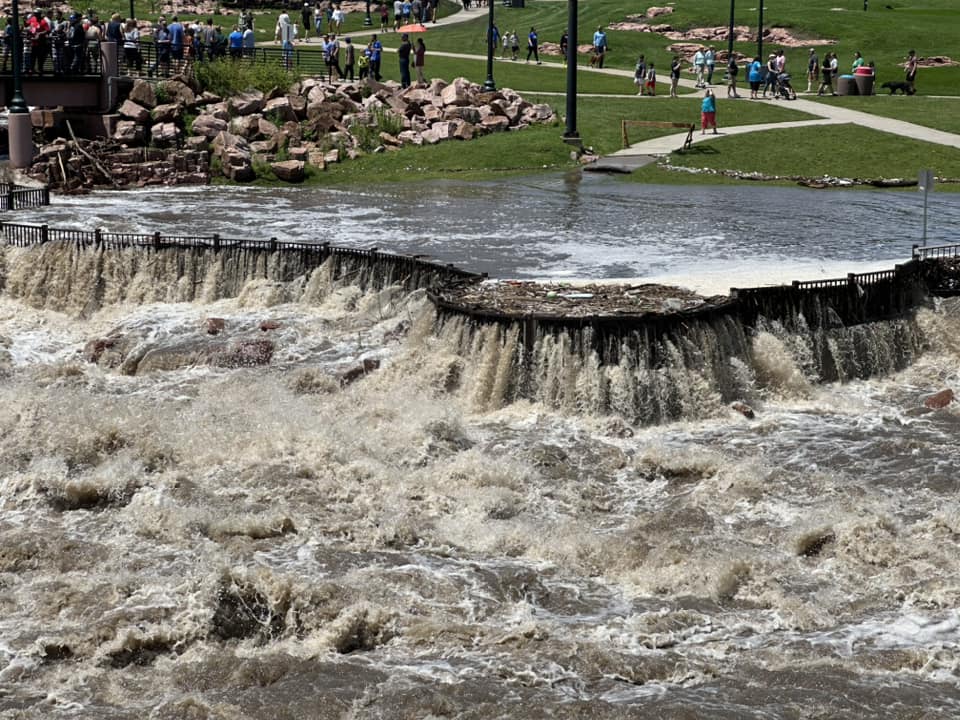 Photo of flooded observation/viewing area below the walking bridge at Falls Park in Sioux Falls, SD