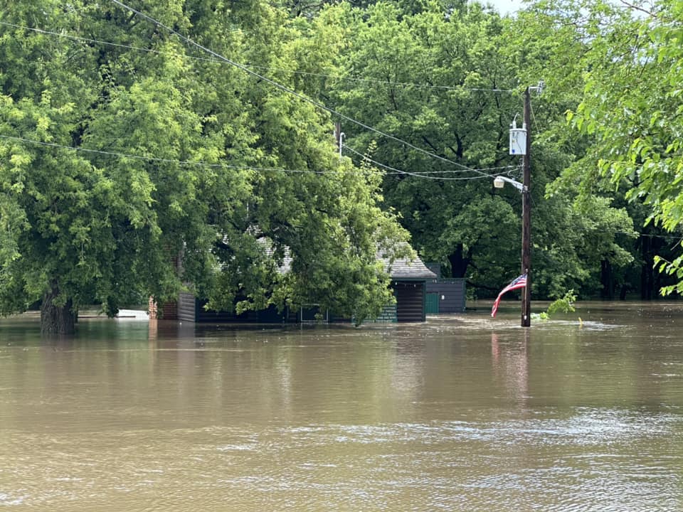 Photo of a submerged building at Leif Erikson Camp in eastern Sioux Falls, SD