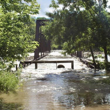 Photo of flooded Klondike Bridge at the IA/SD border