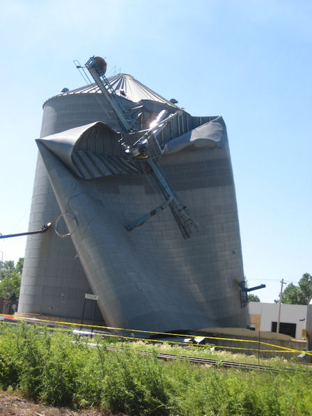 Grain bin blown off foundation and flattened