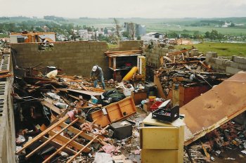 A house totally destroyed.  Three people in this house and no injuries.  Taken 17 June 1992.