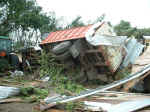 Toppled farm equipment at farm east of Davis.