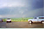 Three separate funnel clouds/tornadoes north of Centerville, SD.