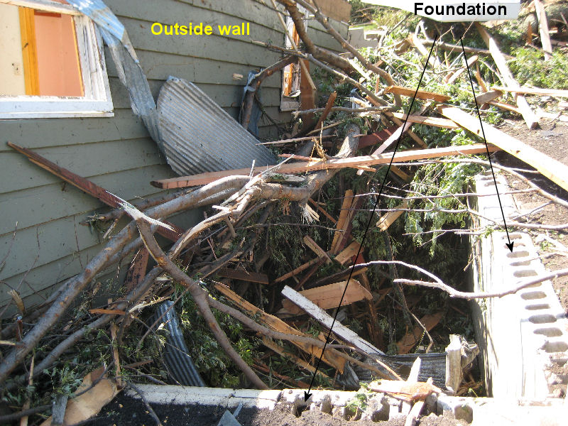 Destroyed home that was moved off of its foundation.