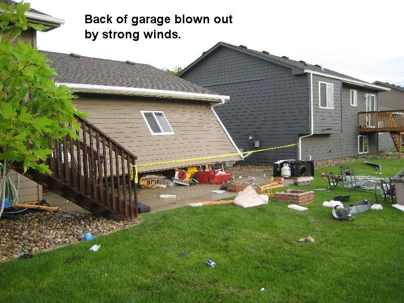 Back wall of garage separated from foundation.