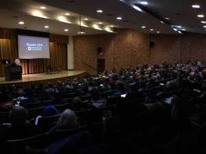 picture of staff member conducting a talk