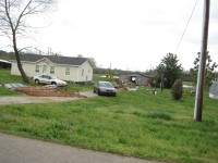 The tornado displaced this debris from an outbuilding into a driveway.