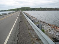 Wind and debris from the tornado eroded the shoulder of CR 67 causeway near the Marshall-Jackson county line. In the top right portion of the image, you can see where the tornado caused damage at the South Sauty campground.