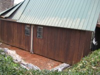 This wooden house at Preston Island was pushed 5 to 10 feet off its block foundation.