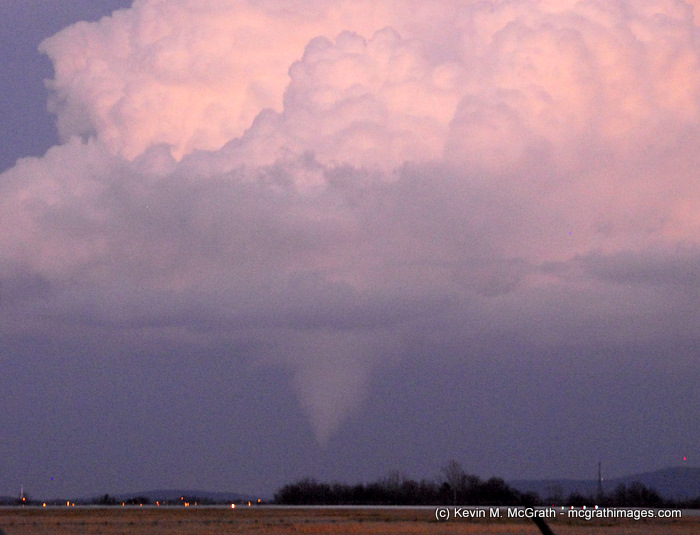 View of the tornado and storm cloud looking east towards Huntsville. Taken from the Huntsville International Airport.  Photograph courtesy of Kevin McGrath. 