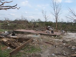 A house swept clean off its foundation in Phil Campbell, AL.