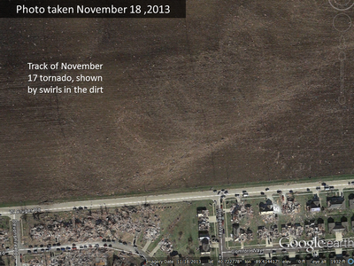 Swirls and debris in the dirt as the tornado leaves Washington