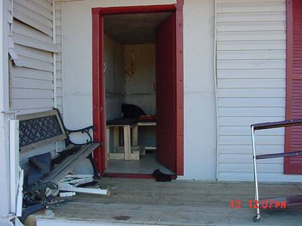 Above ground safe room constructed inside a storage shed