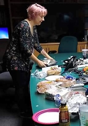 Amy helping organize an office potluck