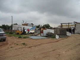 Image of damage from June 9, 2005 storm. Photograph taken by Brian LaMarre, Warning Coordination Meteorologist, WFO Lubbock, TX.