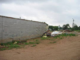 Image of damage from June 9, 2005 storm. Photograph taken by Brian LaMarre, Warning Coordination Meteorologist, WFO Lubbock, TX.