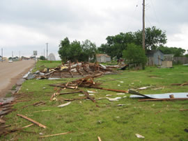 Image of damage from June 9, 2005 storm. Photograph taken by Brian LaMarre, Warning Coordination Meteorologist, WFO Lubbock, TX.