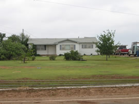 Image of damage from June 9, 2005 storm. Photograph taken by Brian LaMarre, Warning Coordination Meteorologist, WFO Lubbock, TX.