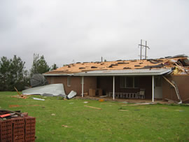 Image of damage from June 9, 2005 storm. Photograph taken by Brian LaMarre, Warning Coordination Meteorologist, WFO Lubbock, TX.