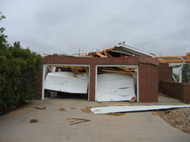 Image of damage from June 9, 2005 storm. Photograph taken by Brian LaMarre, Warning Coordination Meteorologist, WFO Lubbock, TX.