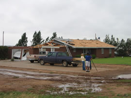 Image of damage from June 9, 2005 storm. Photograph taken by Brian LaMarre, Warning Coordination Meteorologist, WFO Lubbock, TX.