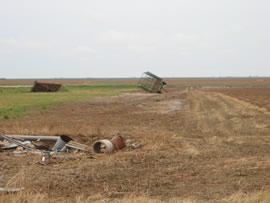 Image of damage from June 9, 2005 storm. Photograph taken by Brian LaMarre, Warning Coordination Meteorologist, WFO Lubbock, TX.