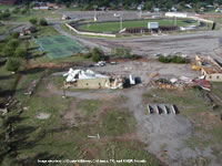 Damage associated with the tornado in the Fair Park area (east of the High School).