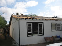 Damage to residential area to the west of the Childress High School.