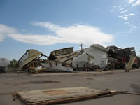 Damage associated with the tornado in the Fair Park area (east of the High School).