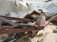 Damage associated with the tornado in the Fair Park area (east of the High School).