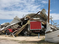 Damage associated with the tornado in the Fair Park area (east of the High School).