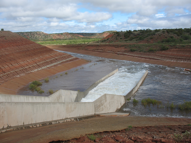 A view of water rushing down the spillway on the southeast side of Lake Alan Henry (Photographs taken by John Lipe and Marty Mullen, NWS Lubbock) 