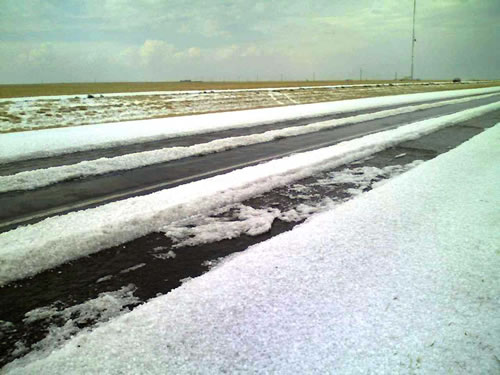 Image of hail taken on Highway 60 between Friona and Bovina around 4:30 pm on 23 April 2008. Picture courtesy of KVII and Coty Ivey.Click on the image for a larger view.